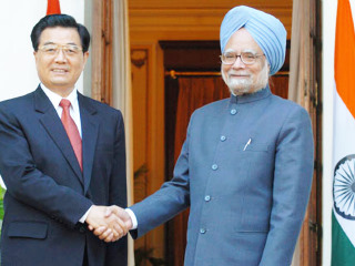 Hu Jintao y Manmohan Singh; clic para aumentar